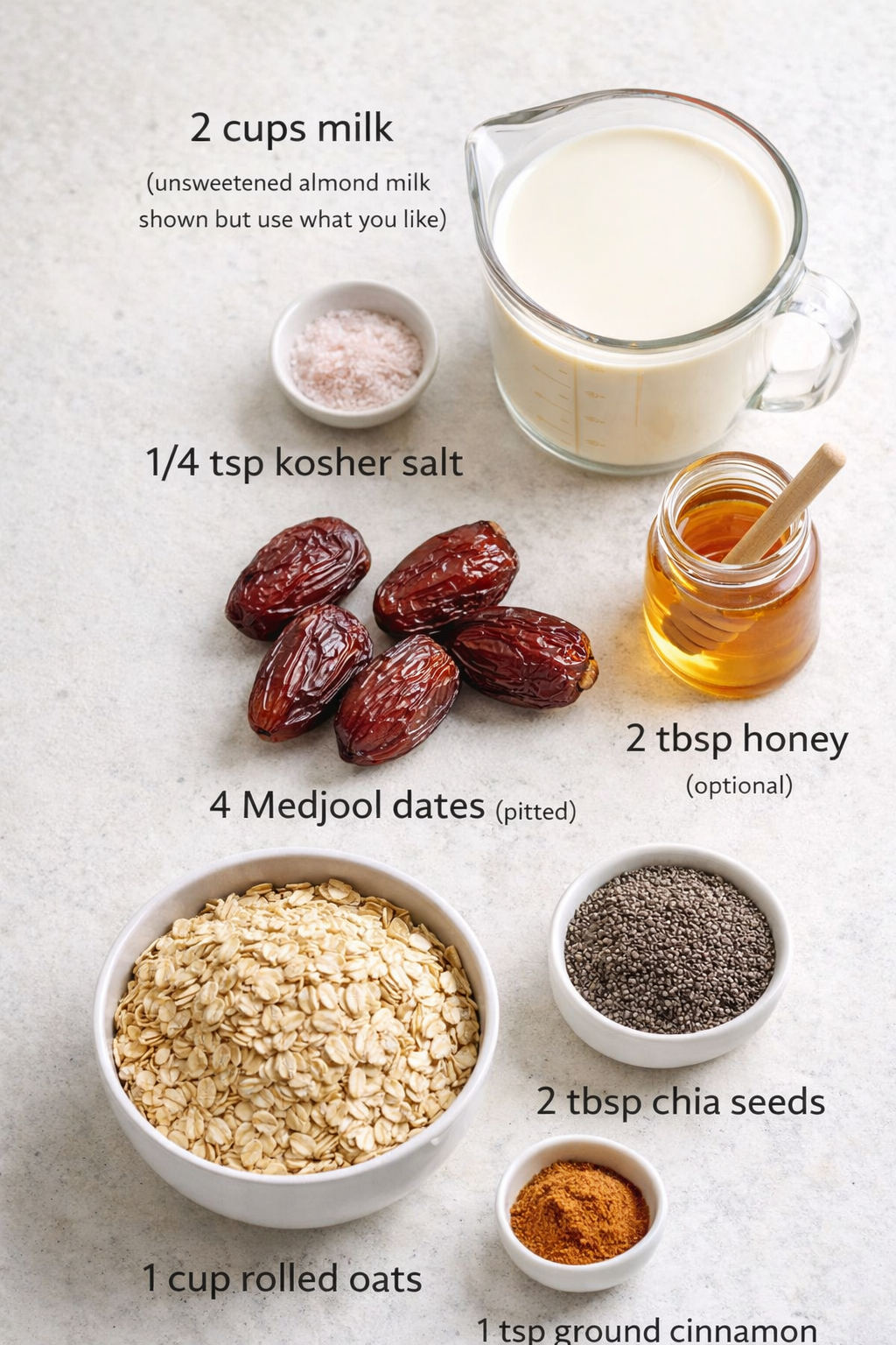 Measured ingredients arranged for 10-Minute Date Overnight Oats with Chia Seeds: 2 cups milk (unsweetened almond milk is my favorite but use what you like), 1/4 tsp kosher salt, 2 tbsp honey (totally optional but adds a