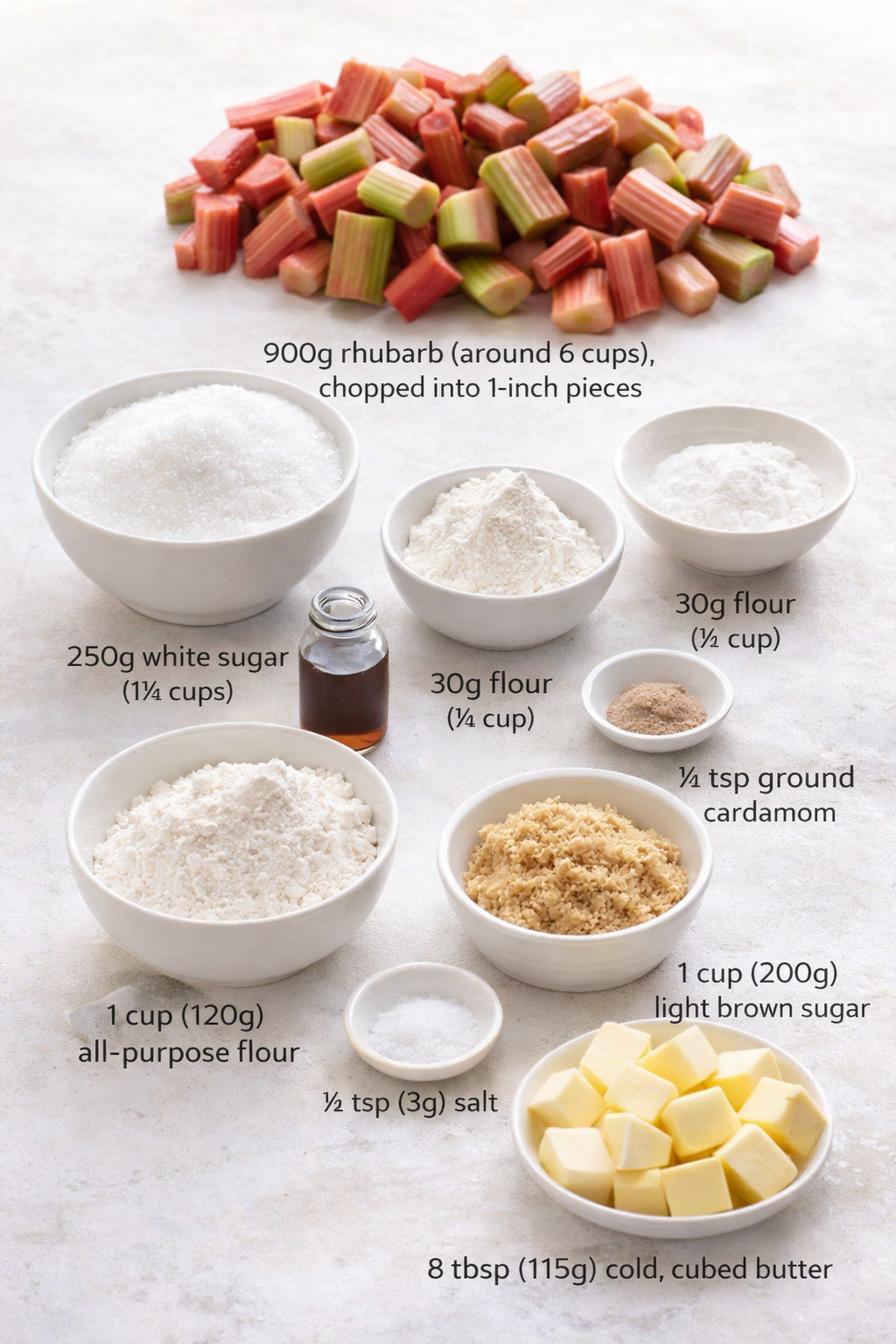 Measured ingredients arranged for British Rhubarb Crumble: 900g rhubarb (around 6 cups) — chopped into 1-inch pieces. Fresh rhubarb makes a big difference here., 250g white sugar (1¼ cups) — enough to balance the tartnes